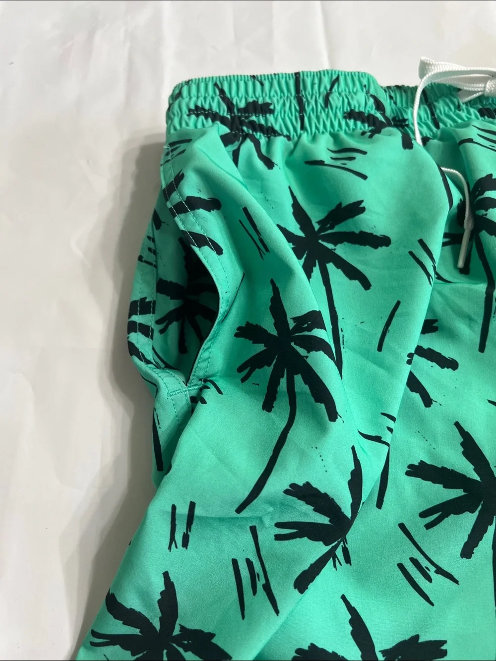 Chubbies Two-Tone Mint and Black Palm Swim Shorts